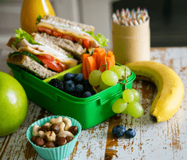 Back to school concept - packed school lunch on kitchen background, copy space