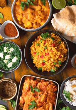 Assorted indian food on black background   Indian cuisine  Top view with copy space  Panorama, banner