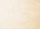 Pastel light golden trendy festive background. Sparkling glittering backdrop for design.
