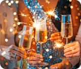 Friends celebrating Christmas or New Year's eve with Bengal lights and champagne.  